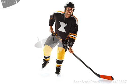 Image of one caucasian man hockey player in studio silhouette isolated on white background