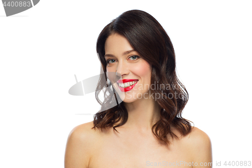 Image of beautiful smiling young woman with red lipstick