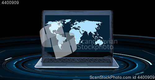 Image of world map on laptop computer screen