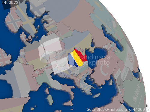 Image of Romania with flag on globe