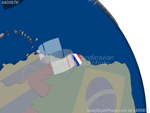 Image of French Guiana with flag on globe