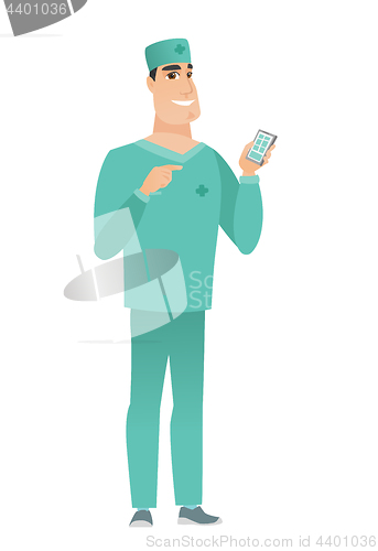 Image of Caucasian doctor holding a mobile phone.
