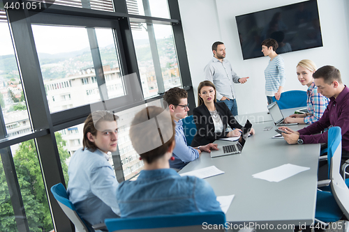 Image of Business Team At A Meeting at modern office building