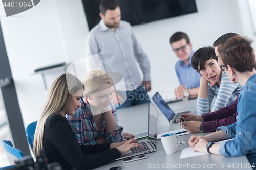 Image of Group of young people meeting in startup office