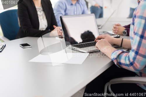 Image of Business Team At A Meeting at modern office building