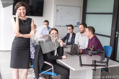 Image of Business Team At A Meeting at modern office building