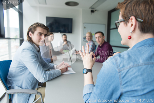 Image of Business Team At A Meeting at modern office building