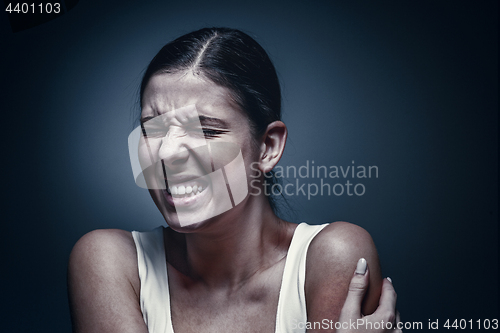 Image of Close up portrait of a crying woman with bruised skin and black eyes