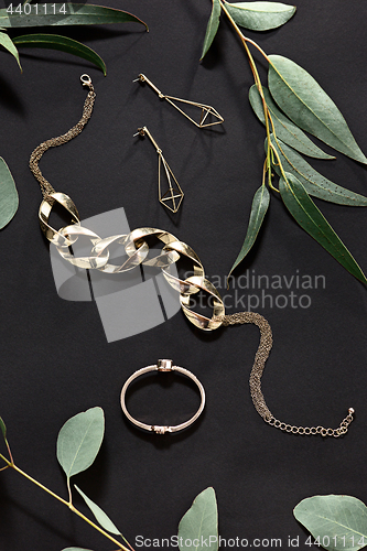 Image of Woman accessories on black, top view