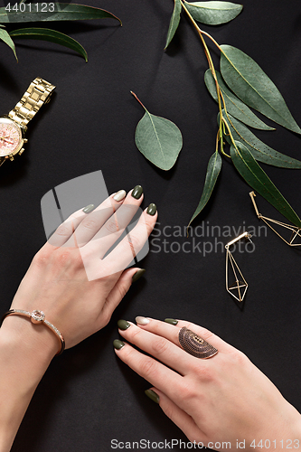 Image of Woman accessories on black, top view