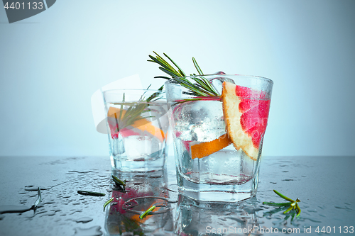 Image of closeup of a cape cod cocktail or vodka cranberry on a blue background