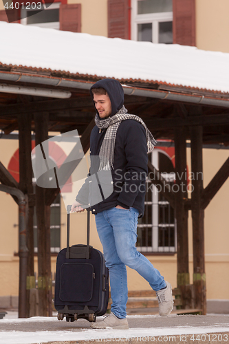 Image of Young man traveling
