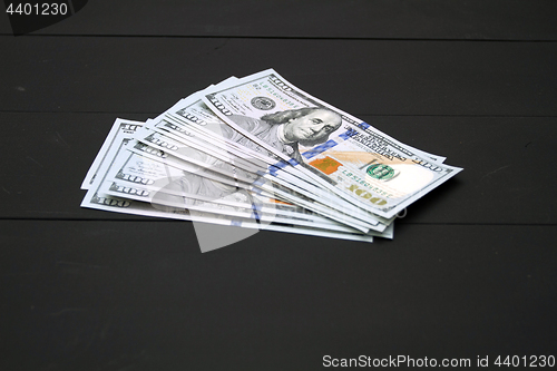 Image of Money on black background