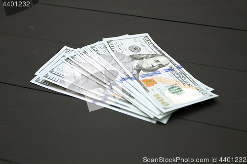 Image of Money on black background