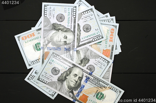 Image of Money on black background