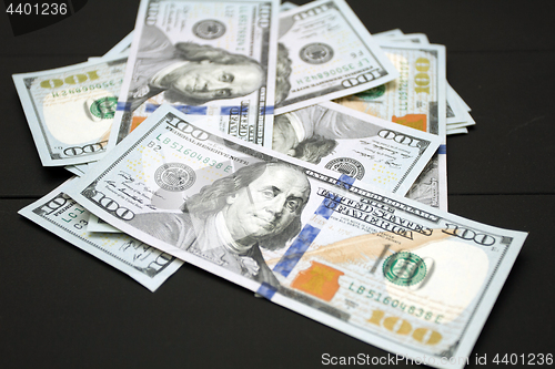 Image of Money on black background