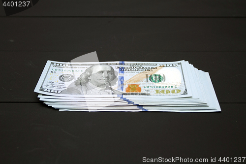 Image of Money on black background