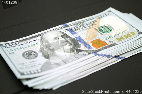 Image of Money on black background