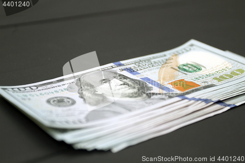 Image of Money on black background