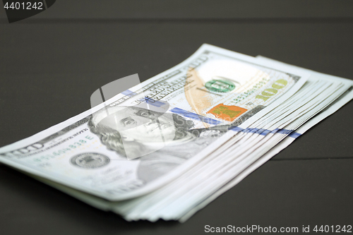 Image of Money on black background