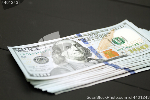 Image of Money on black background