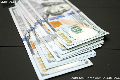 Image of Money on black background