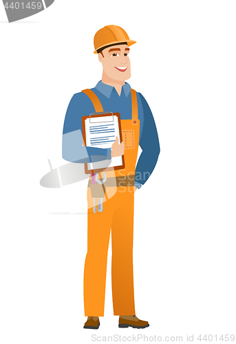 Image of Builder holding clipboard with papers.