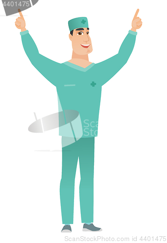 Image of Doctor standing with raised arms up.