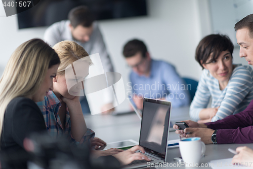 Image of Group of young people meeting in startup office