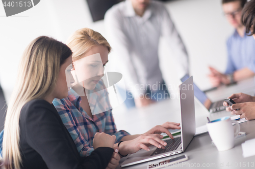 Image of Group of young people meeting in startup office