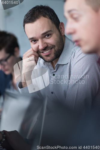 Image of Business Team At A Meeting at modern office building