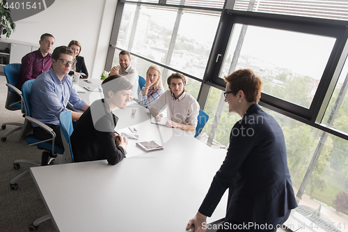 Image of Group of young people meeting in startup office