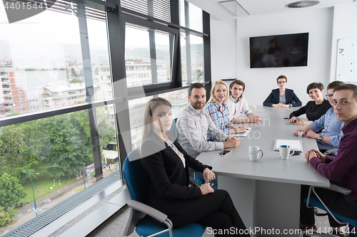 Image of Group of young people meeting in startup office