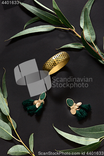 Image of Woman accessories on black, top view