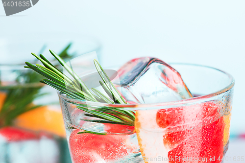 Image of closeup of a cape cod cocktail or vodka cranberry on a blue background