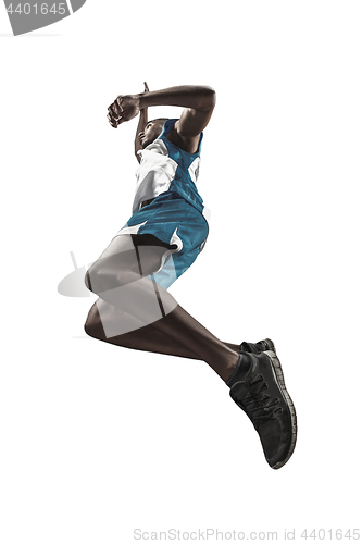 Image of Full length portrait of a basketball player with ball