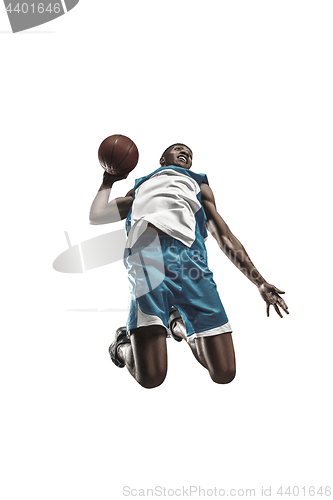 Image of Full length portrait of a basketball player with ball