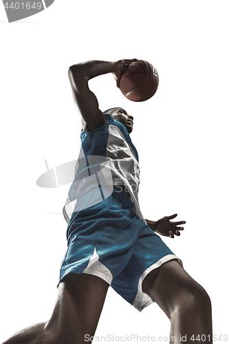 Image of The portrait of a basketball player with ball