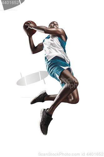 Image of Full length portrait of a basketball player with ball