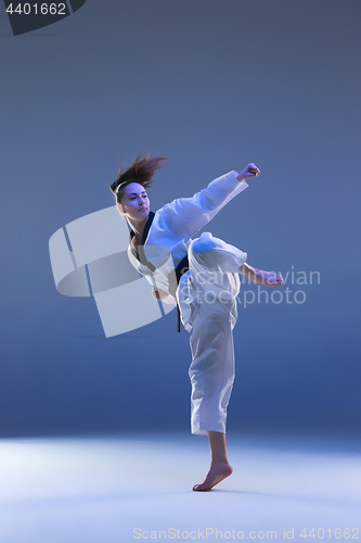 Image of The karate girl with black belt