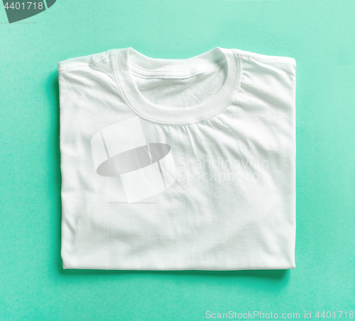 Image of white folded t shirt