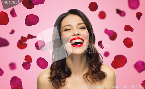 Image of beautiful laughing young woman with red lipstick