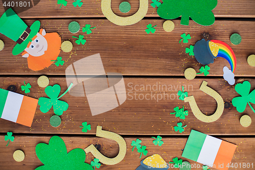 Image of st patricks day decorations on wooden background