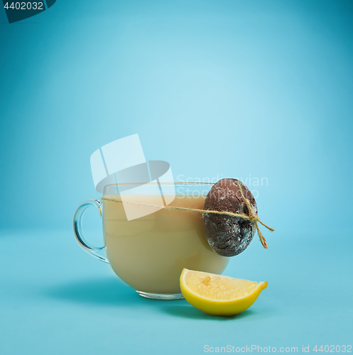 Image of The herbal tea on a blue background