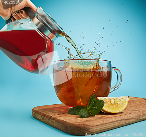 Image of The herbal tea on a blue background