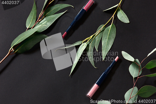 Image of Woman accessories on black, side view