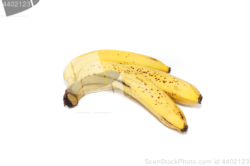 Image of Ripe yellow bananas on white background