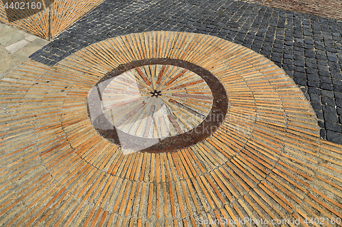 Image of Pavement with concentric pattern. Patterned floor walkway in the