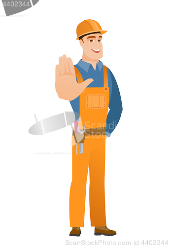 Image of Caucasian builder showing palm hand.