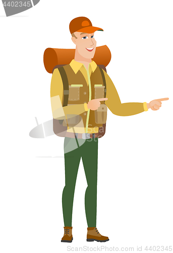 Image of Caucasian traveler pointing to the side.